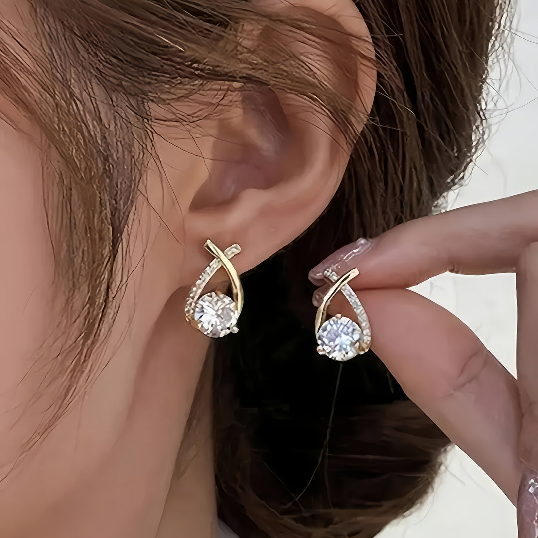 Pendientes de cruz en circonio color oro