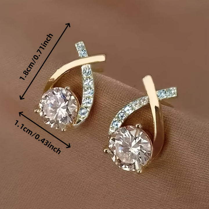 Pendientes de cruz en circonio color oro