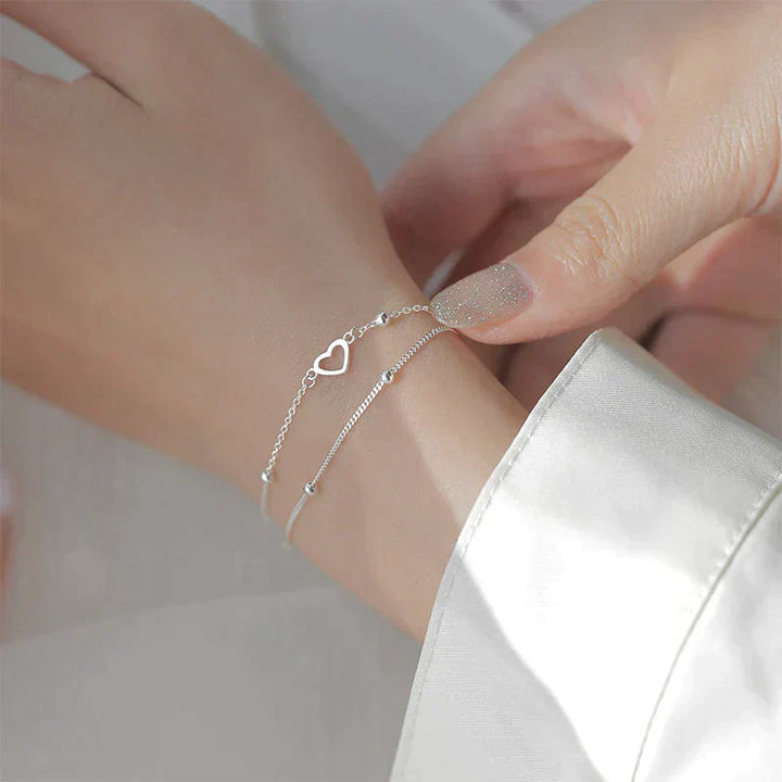 Pulsera de plata ajustable con colgante en forma de corazón