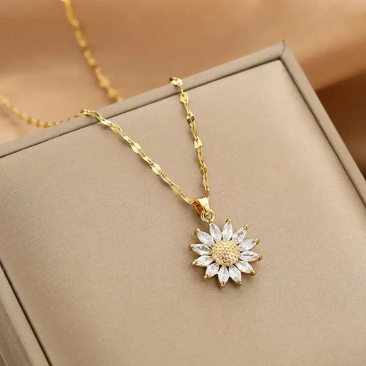 Collar de cristal color oro con colgante de girasol