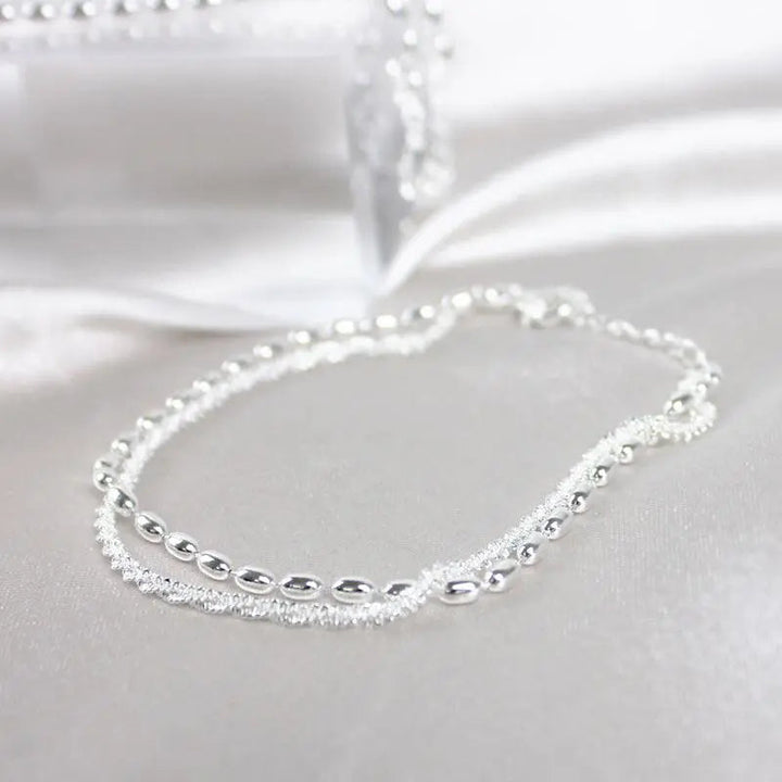 Set de pulseras de plata con circón