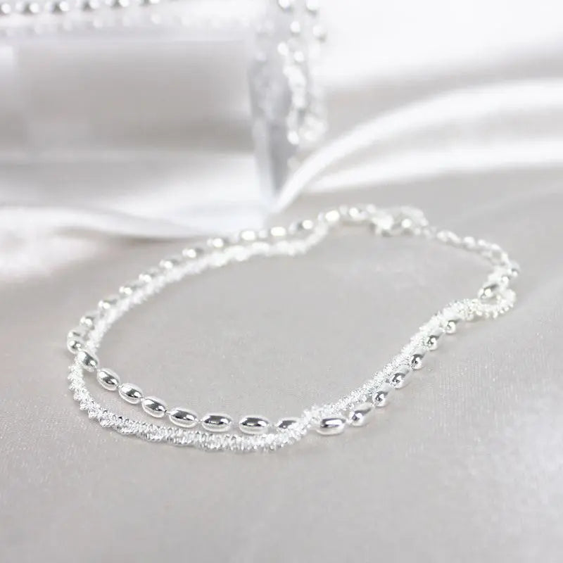 Set de pulseras de plata con circón