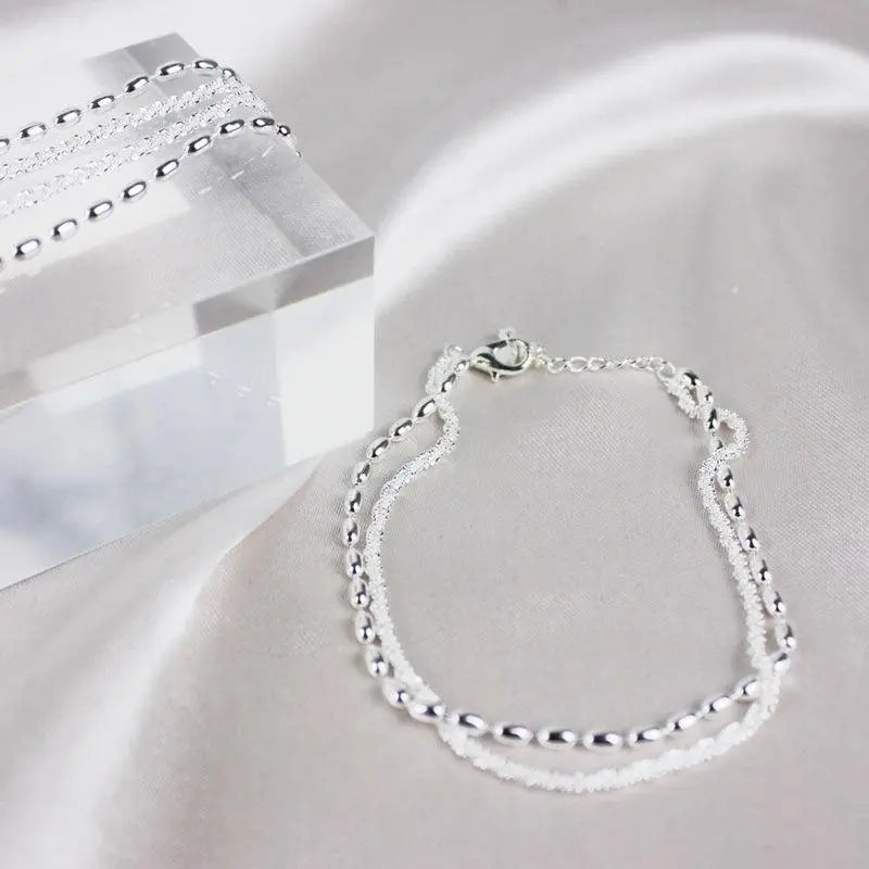 Set de pulseras de plata con circón