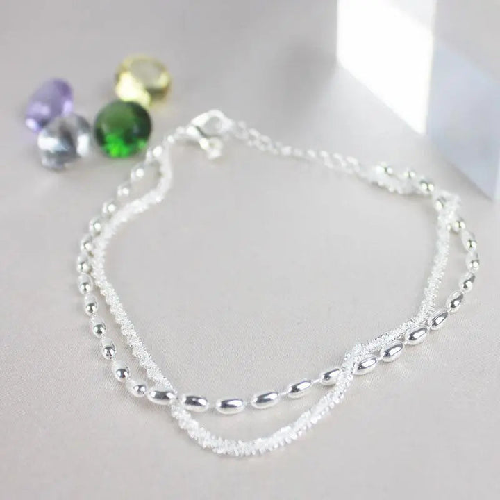 Set de pulseras de plata con circón
