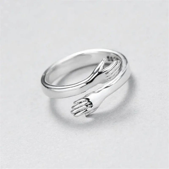 Anillo ajustable de plata estilo Abrazo