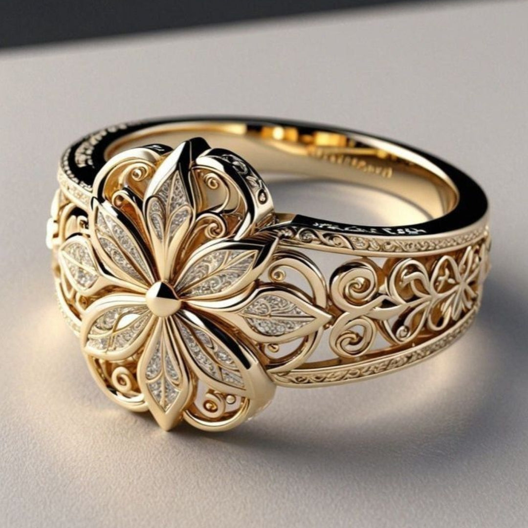 Anillo flor exótica de oro y circonita