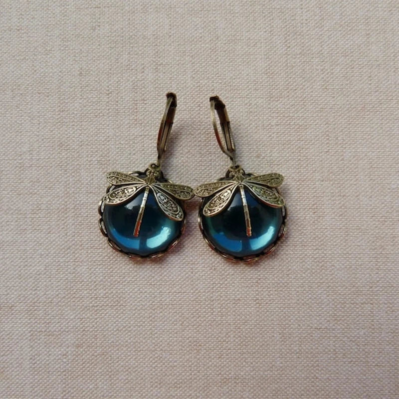 Pendientes esféricos de oro antiguo con diseño de libélula