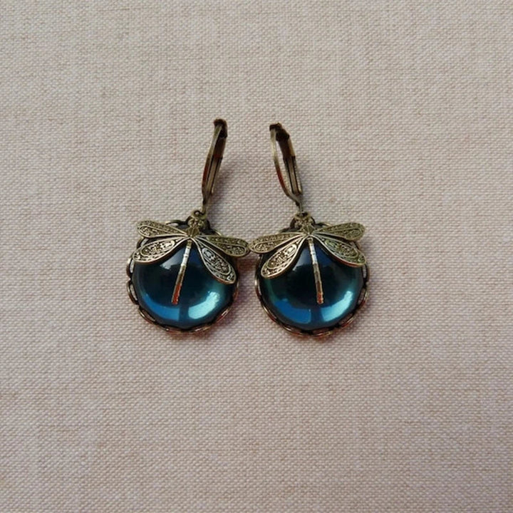 Pendientes esféricos de oro antiguo con diseño de libélula