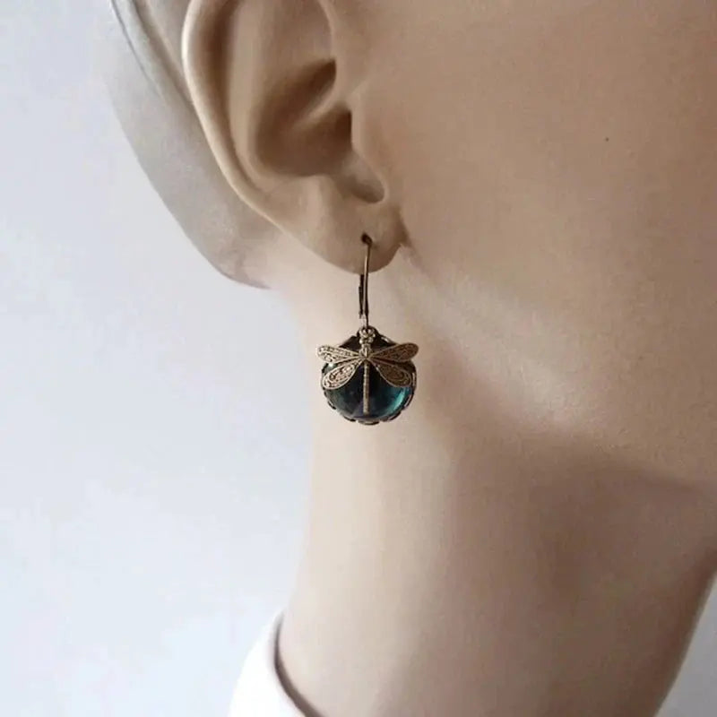 Pendientes vintage esféricos dorados con libélula
