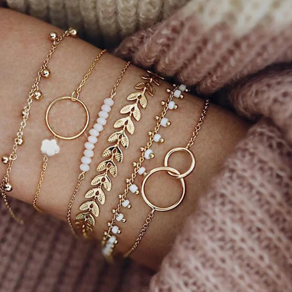 Set de pulseras boho doradas