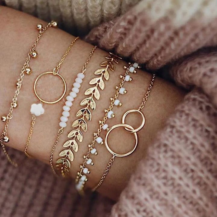 Set de pulseras boho doradas