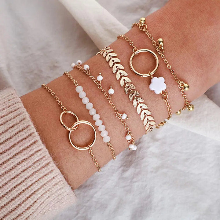 Set de pulseras boho doradas