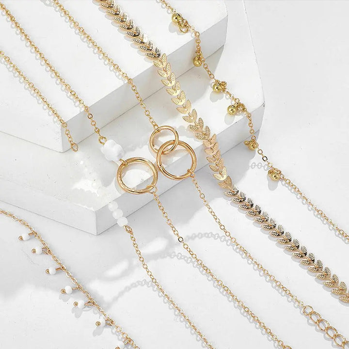 Set de pulseras boho doradas