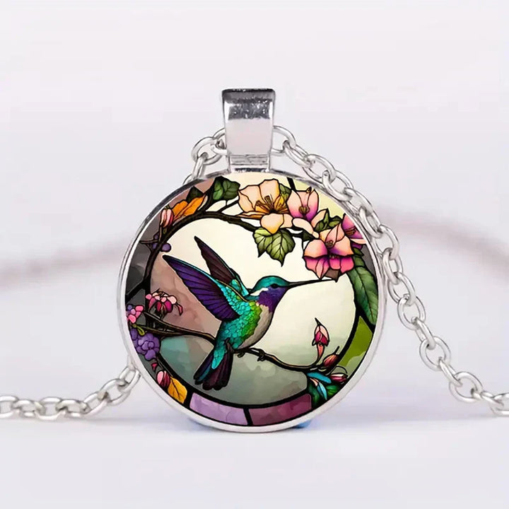 Colgante colibrí con cúpula de vidrio