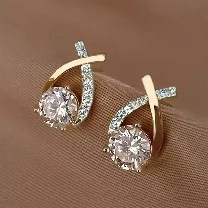 Pendientes de cruz en circonio color oro