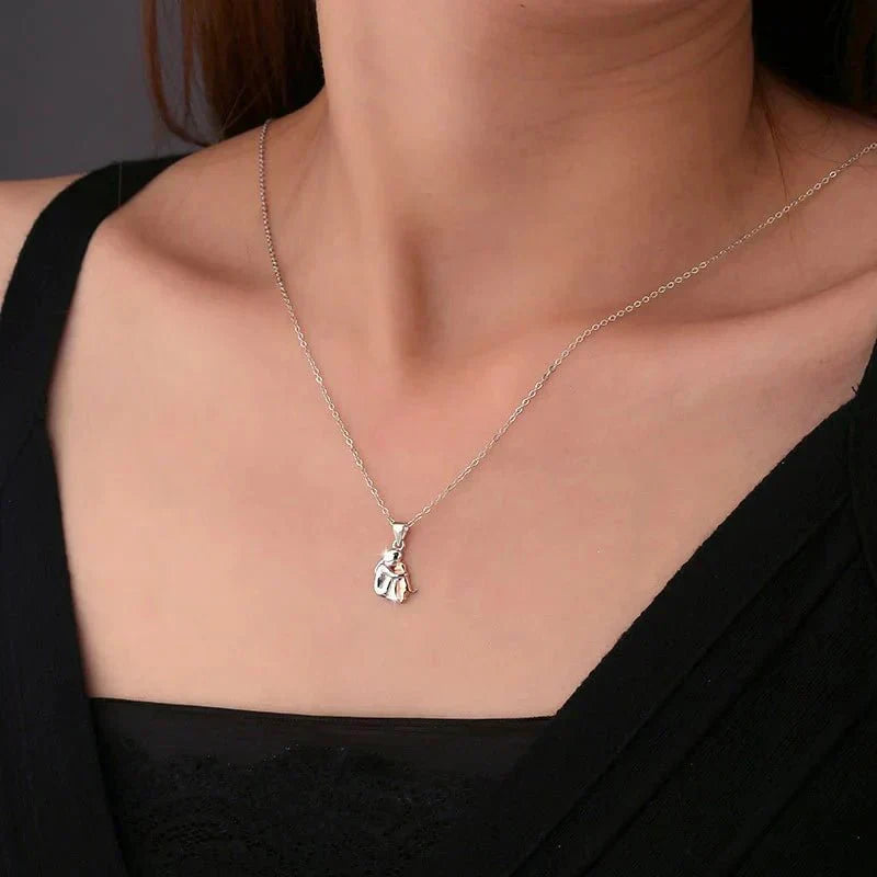 Collar colgante 'Abrazo' con pendientes a juego