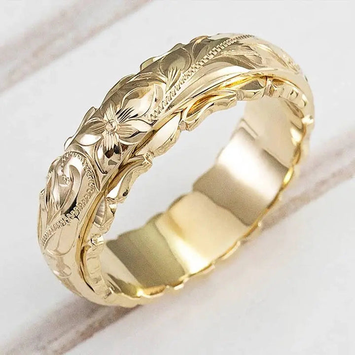 Anillo vintage de oro con diseño floral