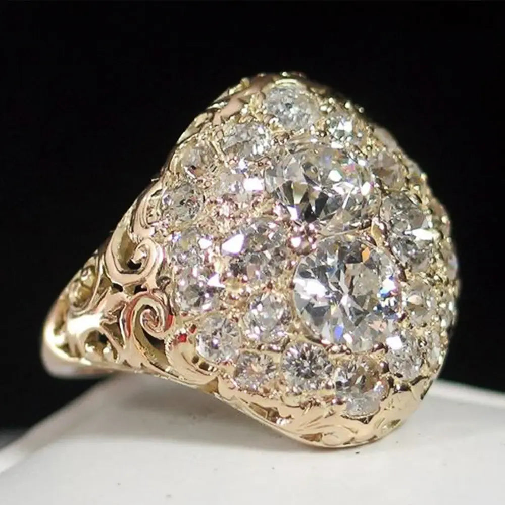 Anillo vintage redondo de oro con diamante