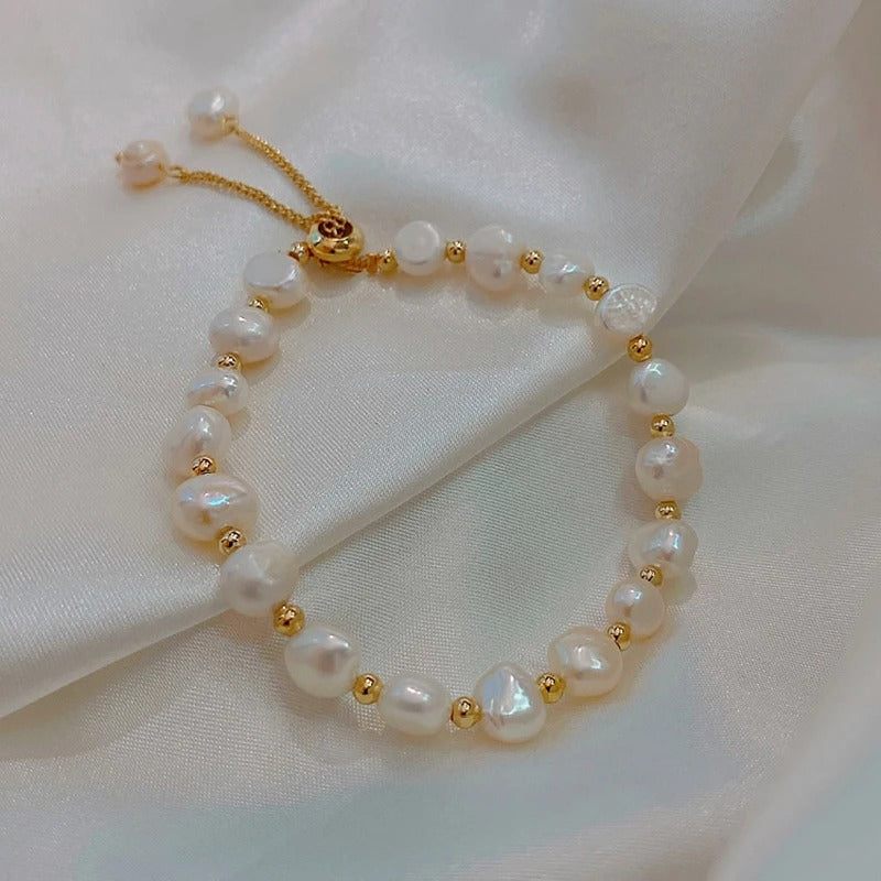 Pulsera vintage con perla blanca y oro